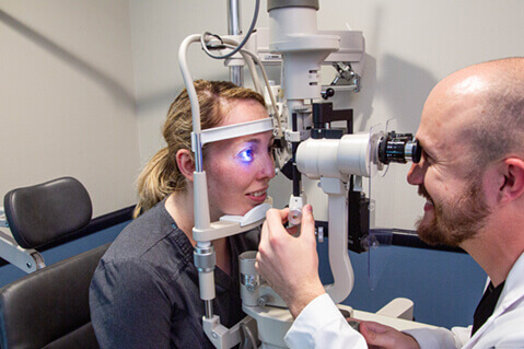 Woman having eye exam