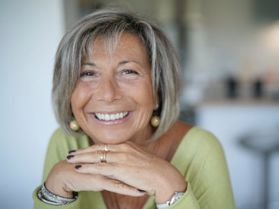 Smiling mature woman cataract self test