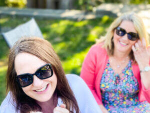 Women outside wearing sunglasses on sunny day