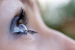 Close up of woman's eye with long eye lashes