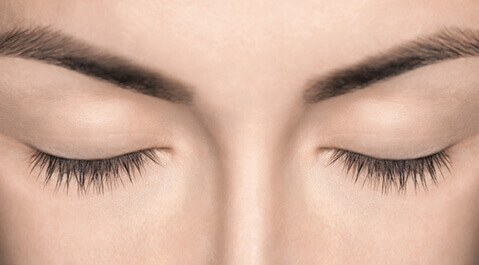 Close up of woman's closed eyelids