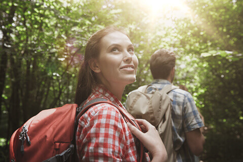 Woman hiking in the woods